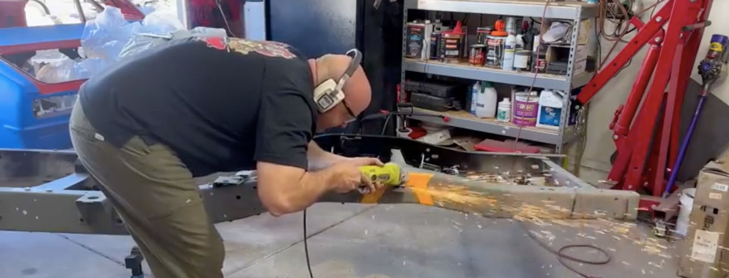 Grinding metal in the Fire Bros garage